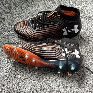 Soccer cleats Under Armour Black and Orange brand new men 7/women 8.5